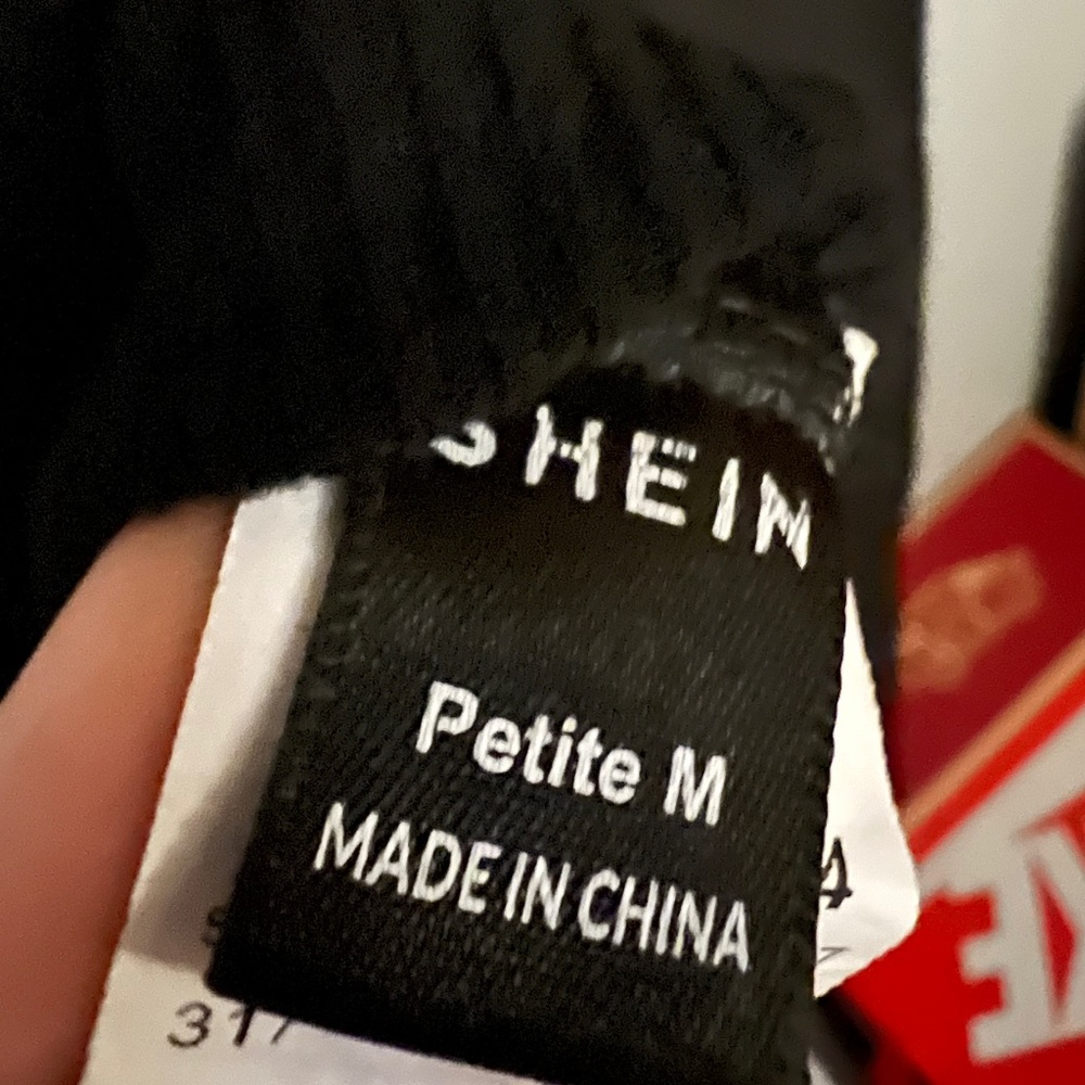 Cropped black long sleeve top